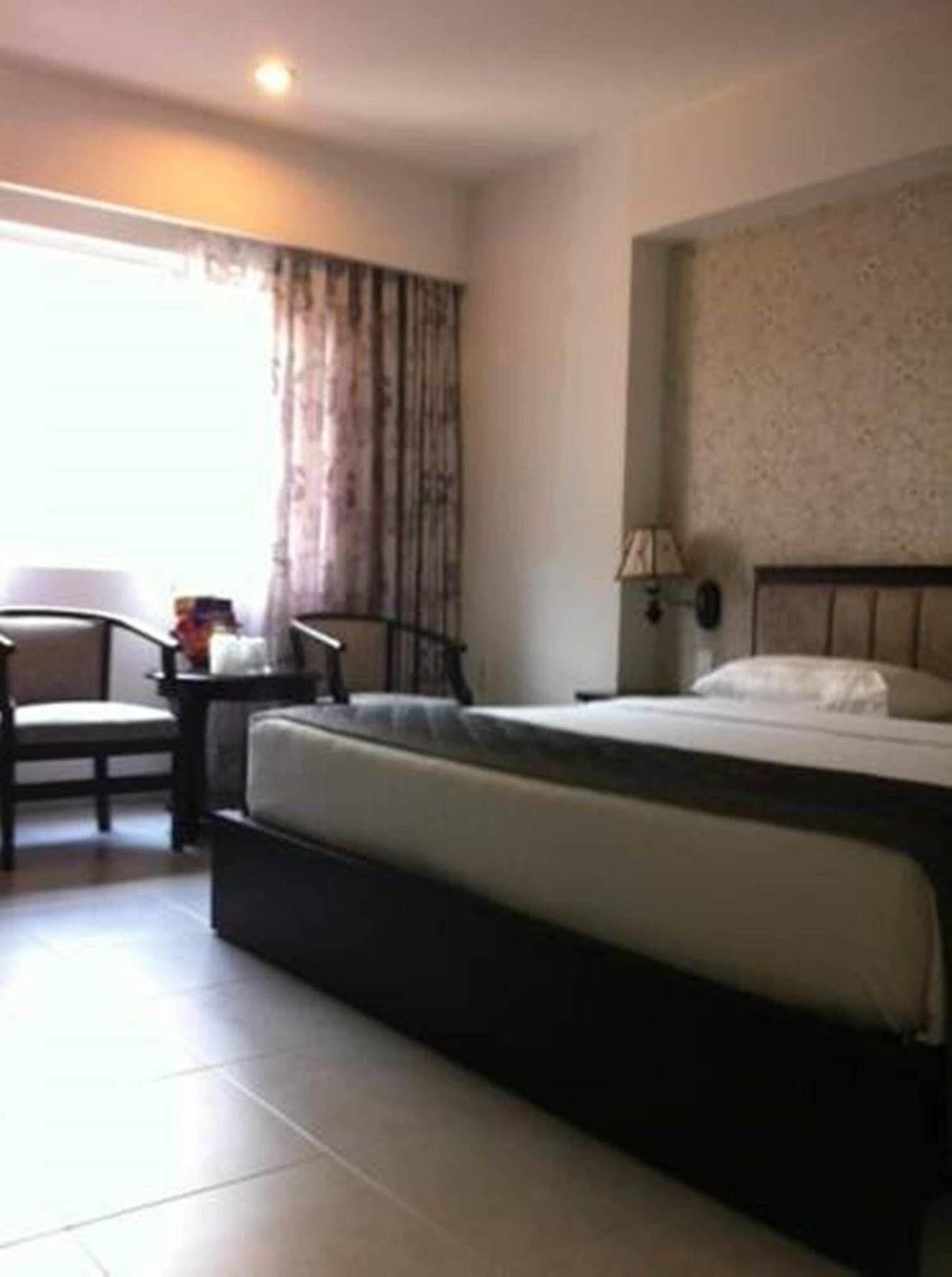 Hoang Vinh Hotel Ho Şi Min Exterior foto